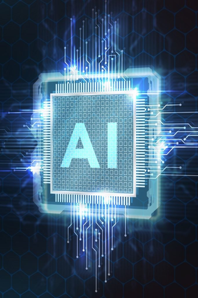 Lit circuit board chip labeled AI representing Norwalk AI solutions